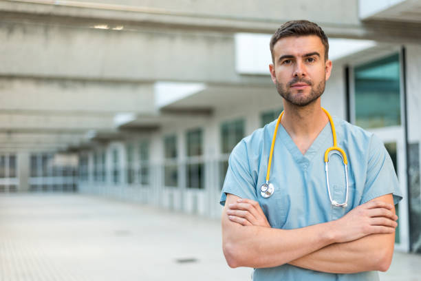 istock male nurse with stethoscope 942403280