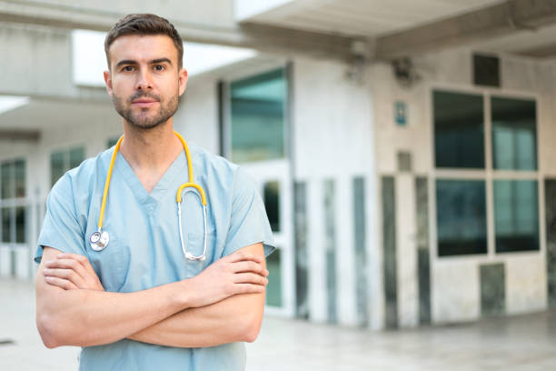 istock male nurse with stethoscope 942403294