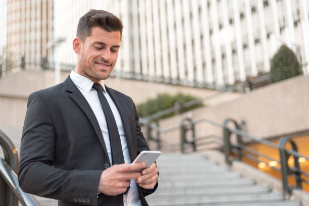 istock man close up with a mobile phone 942403316