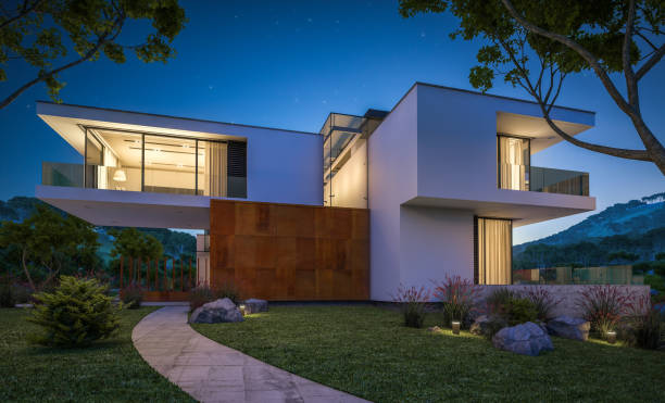 istock 3d rendering of modern cozy house by the river at night 942403570