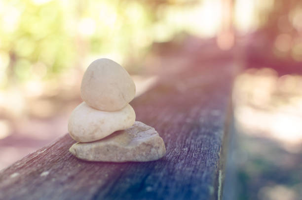A stone pyramid with blur jungle or forest as background. Vintage & pink style & look.
