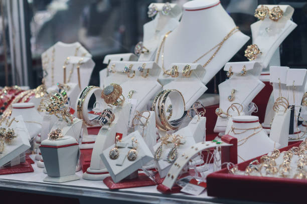 istock Counter with garnet jewelry in store window 942403892