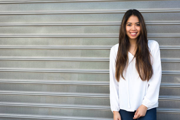 istock happy young woman smiling portrait 942404150
