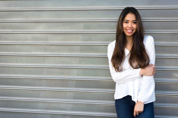 istock happy young woman smiling portrait 942404194