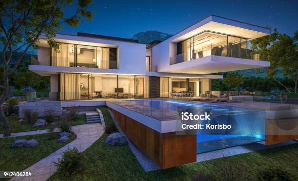 3d Rendering Of Modern Cozy House By The River At Night Stock Photo - Download Image Now