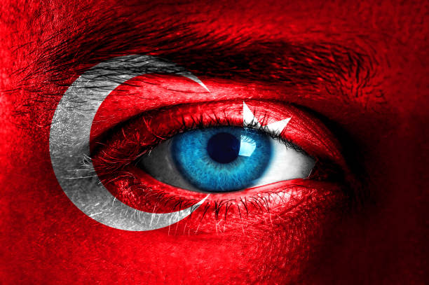 istock Human face painted with flag of Turkey 942406380
