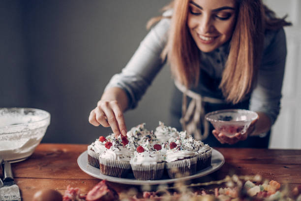 istock Young woman making sweet desert 942407598