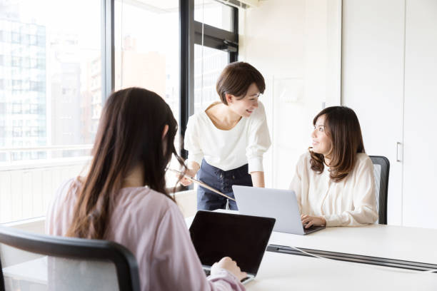 istock asian businesswomen working in office 942417222
