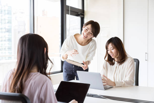 istock asian businesswomen working in office 942417242