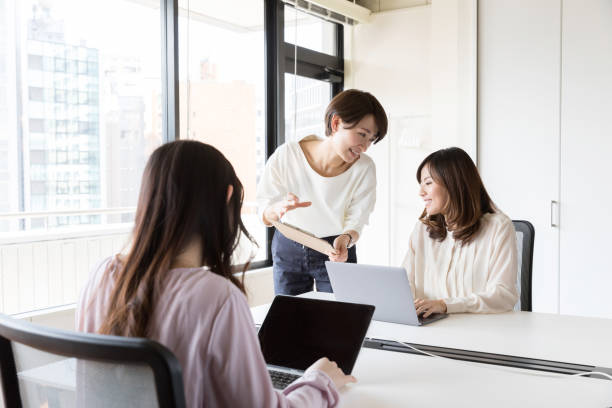 istock asian businesswomen working in office 942417244