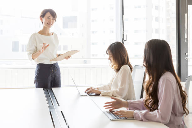 asian businesswomen working in office asian businesswomen working in office only japanese stock pictures, royalty-free photos & images