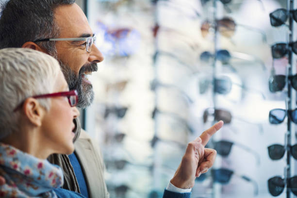 istock Mid aged couple in a shopping mall. 942420630