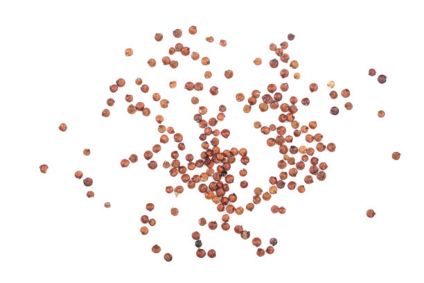 istock red quinoa seeds isolated on white background. Top view 942424434