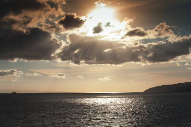 istock Cloudy sunset over bay of Gibraltar, Mediterranean sea 942436364
