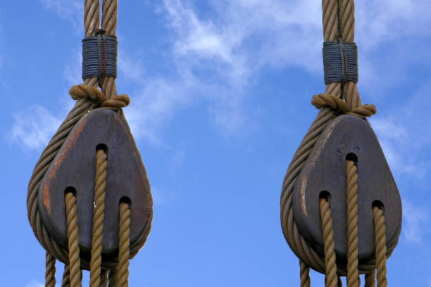 Block and tackle with ropes and railings - vintage ship rigging,Close-Up