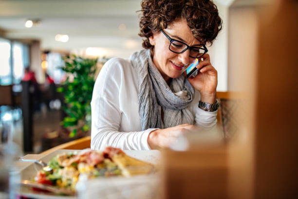 istock Woman at a restaurant 942440066