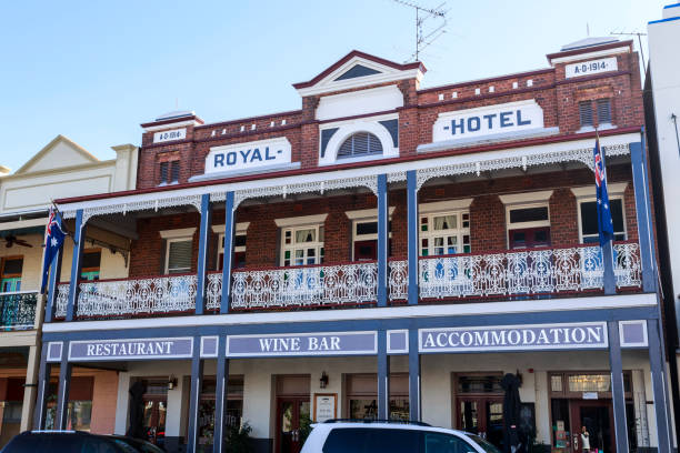 Winton, Queensland: The Australian Hotel in the main street of Winton in outback Queensland, Australia, showing old sheering shed equipment on the wall.  The primary industries in this area are sheep and cattle farming, dinosaur fossils have been found in the local vicinity.