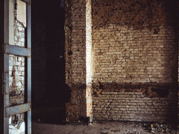 istock abandoned destroyed hall with beautiful light fill the scene 942452184
