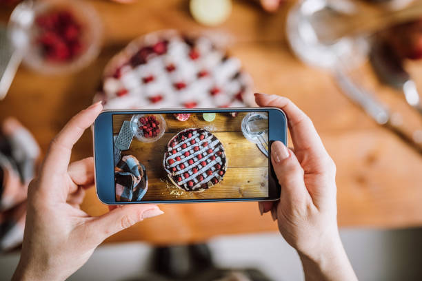 istock Taking Pictures Delicious Berry Pie Decorated With Fresh Raspberries 942452308