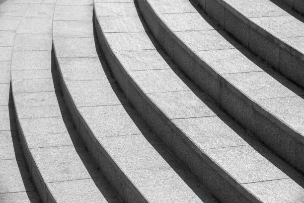 Photo of Architecture background, dark round stairs