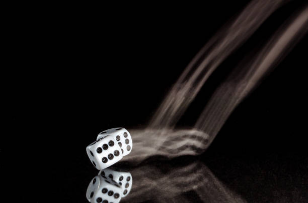 istock Risking All on a Roll of the Dice 942459866