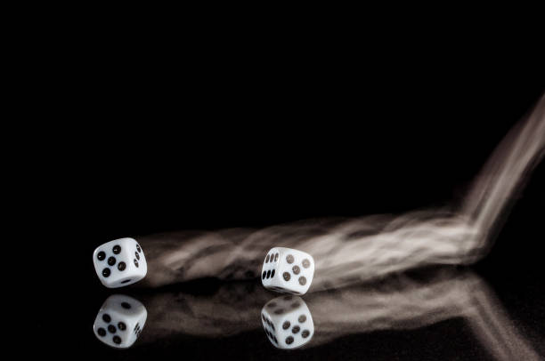 istock Risking All on a Roll of the Dice 942459876