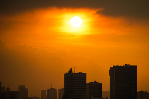 istock Sunset in a City 942462758