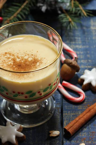 istock Eggnog - Xmas Holiday drink on festive blue background 942462902