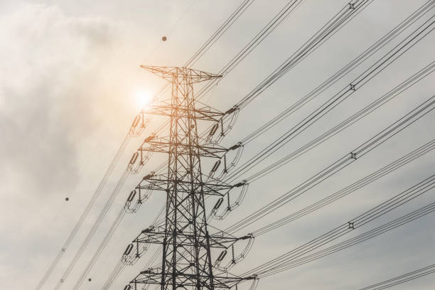 istock Electricity concept. Close up high voltage power lines station. 942469298