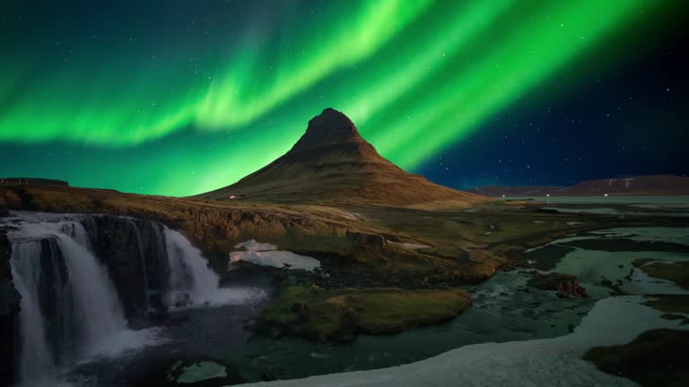 Northern Light (Aurora) or Polar Light in the night sky kirkjufell Iceland