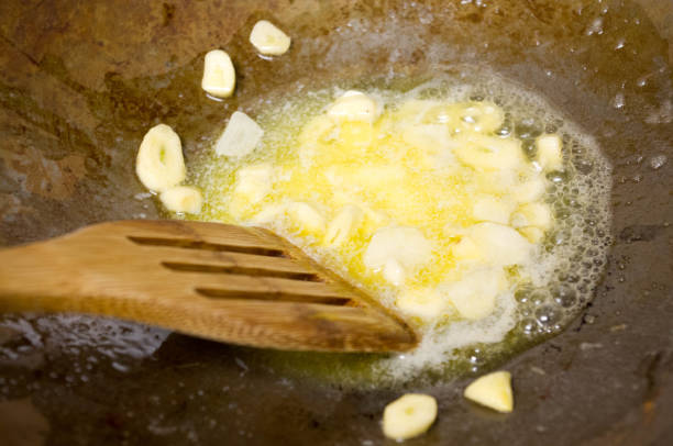 istock Sauteing garlic in butter 942469828