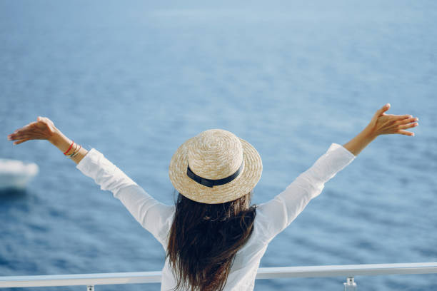 istock girl near sea 942477890