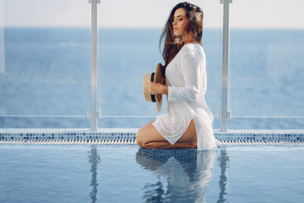 istock girl by the pool 942480158
