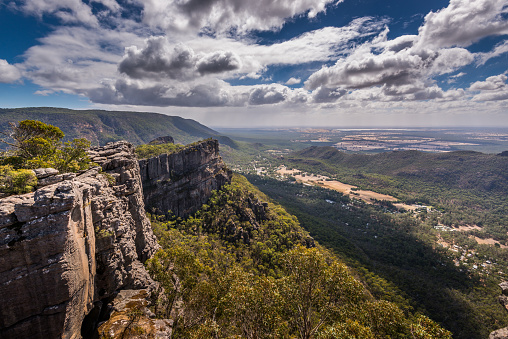 Looking out over the valley and mountains below from the Pinnacles Lookout in the Grampians, Victoria.