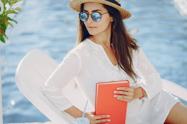 istock girl by the pool 942480266