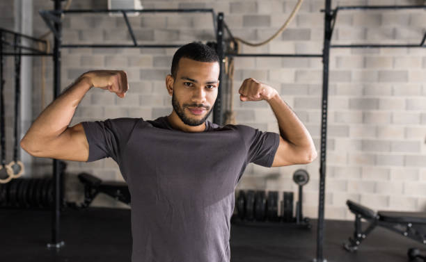istock Athletic Man At The Gym 942491844