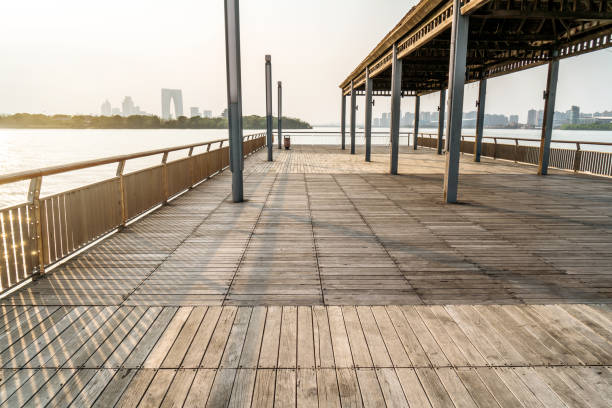 istock Modern architecture and parks, wooden floor scenes. 942494882