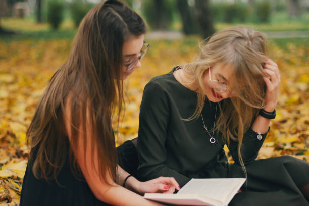 istock girls in a park 942495752