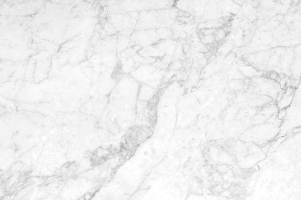 istock Abstract white marble background with natural motifs. 942498814