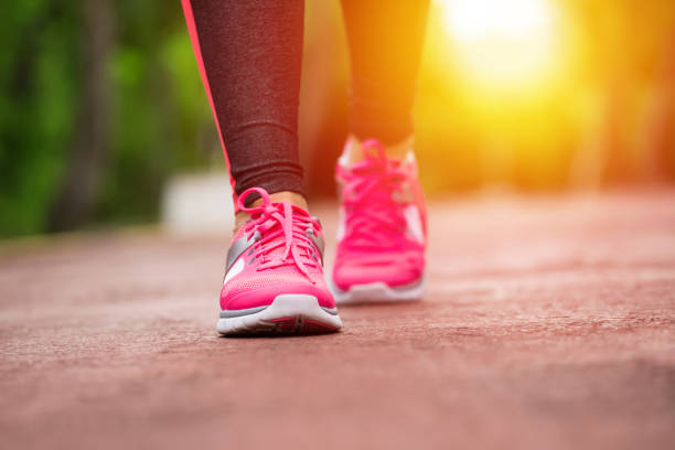istock Fitness woman jogging 942502450