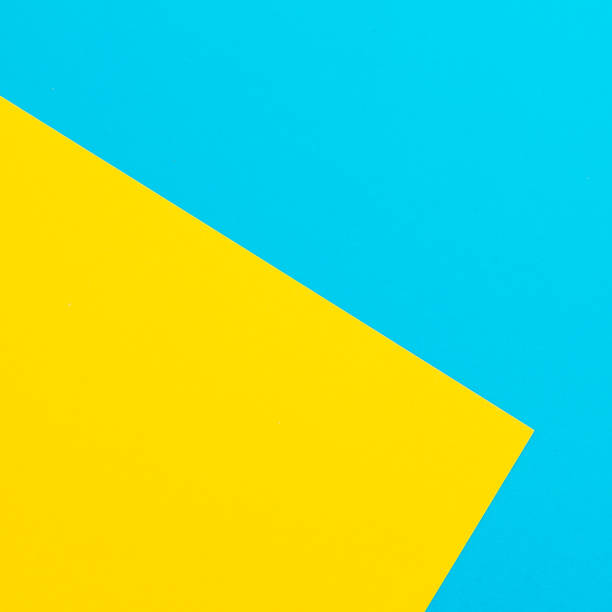 istock Blue and yellow texture background. Flat lay. Top view 942507546