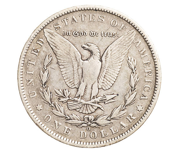 antique silver dollar isolated stock photo