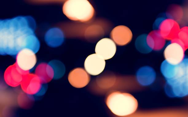 istock Blurred street bokeh lights at night time 942515344