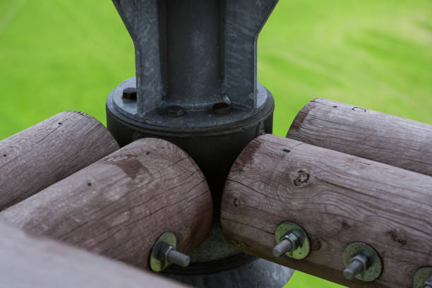 Wood beams professionally connected by metal screw and nut with precision