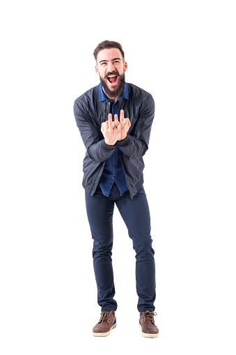 Rude bearded man showing triple middle finger obscene gesture at camera. Full body isolated on white background.