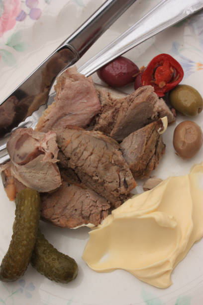 istock Pieces of lamb meat and mayonnaise  Cold buffet 942522808