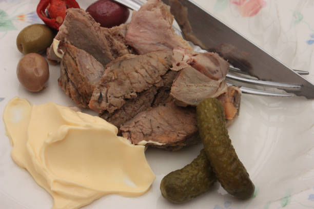 istock Pieces of lamb meat and mayonnaise  Cold buffet 942522814