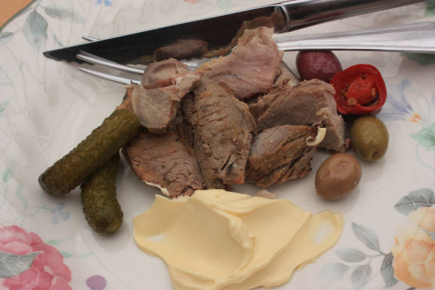 istock Pieces of lamb meat and mayonnaise  Cold buffet 942522820