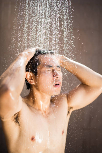 istock Man Shower Water after pool 942527752