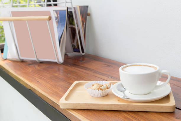 istock coffee cup and biscuit in wood plate 942534168